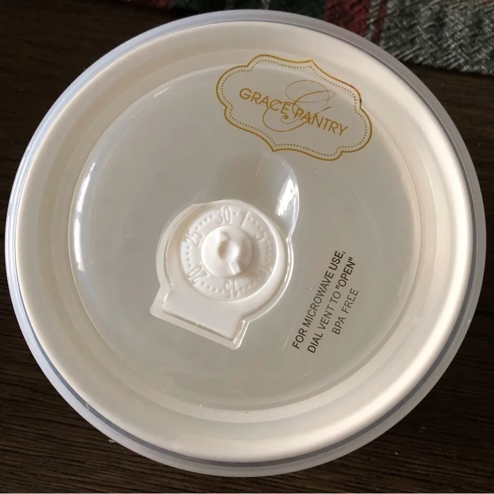 Grace Pantry fine porcelain tulip flowers vented covered bowl in size small.